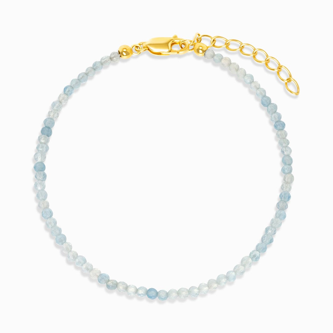 Armband mit Aquamarin-Kristallperlen in Silber und Gold. Kristallarmband mit Aquamarin, dem Geburtsstein des Monats März.