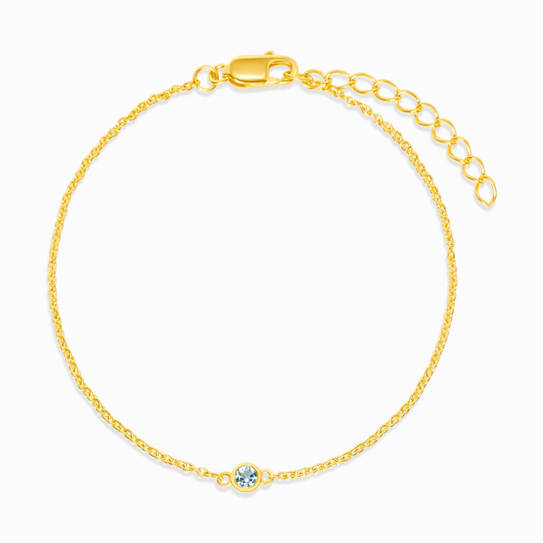 Blautopas-Schmuck zum Tragen als Armband. Kristallarmband mit Blautopas in Gold.