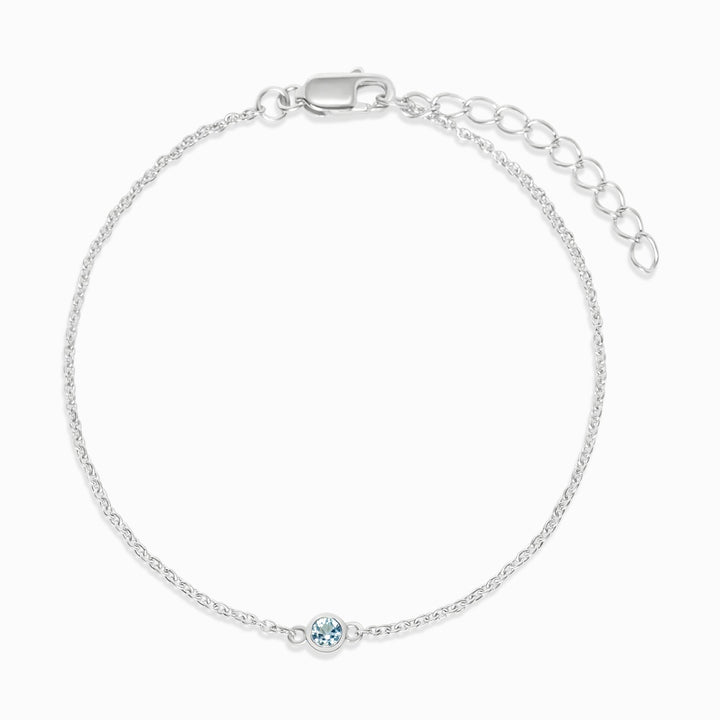 Armband aus blauem Topas und Silber. Smycke mit Kristall Topas als Star für die Kommunikation.