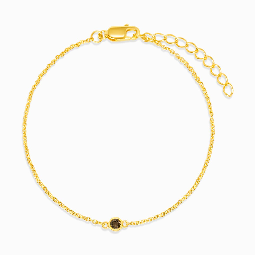 Armband aus Gold mit Rauchquarz. Kristallarmband mit braunem Edelstein Rauchquarz.