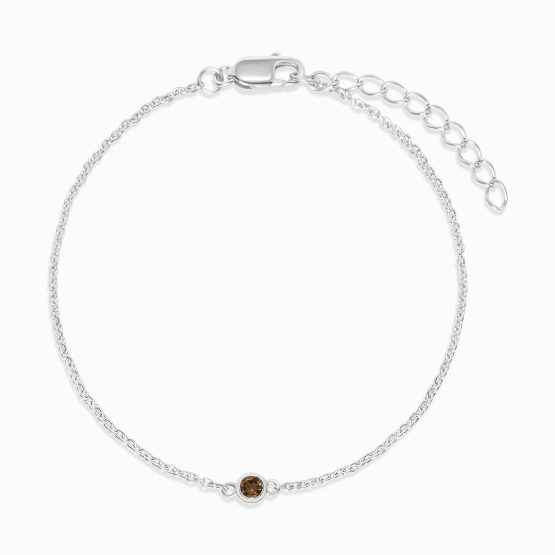 Armband mit braunem Edelstein Rauchquarz, einem magischen Kristall. Schmuck mit Rauchquarz zum Tragen als Armband.